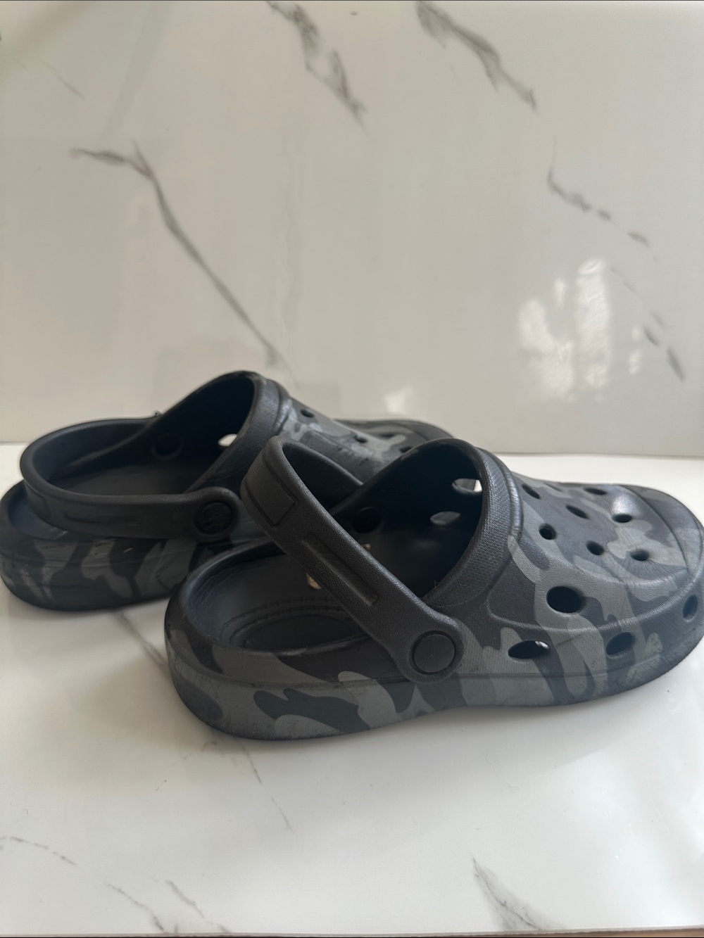 CROCS USED but still Good (has a hole but will be patched)